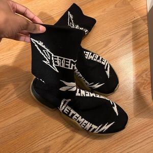 Lightly worn sock shoe.